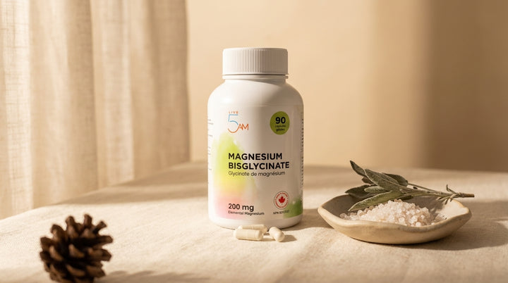 Live 5AM Magnesium Bisglycinate 200mg bottle on cream linen with sage and mineral salt in soft Canadian morning light.