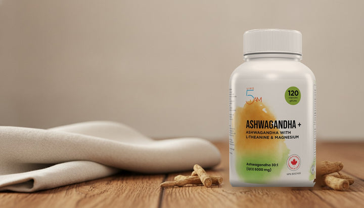 Live 5AM Ashwagandha+ bottle, 120 capsules, NPN 80137426, with dried ashwagandha root on a wooden table